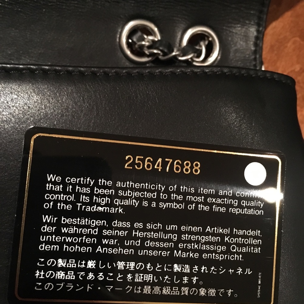 CHANEL Calfskin Studded Quilted Flap Black. - Picture 8 of 8